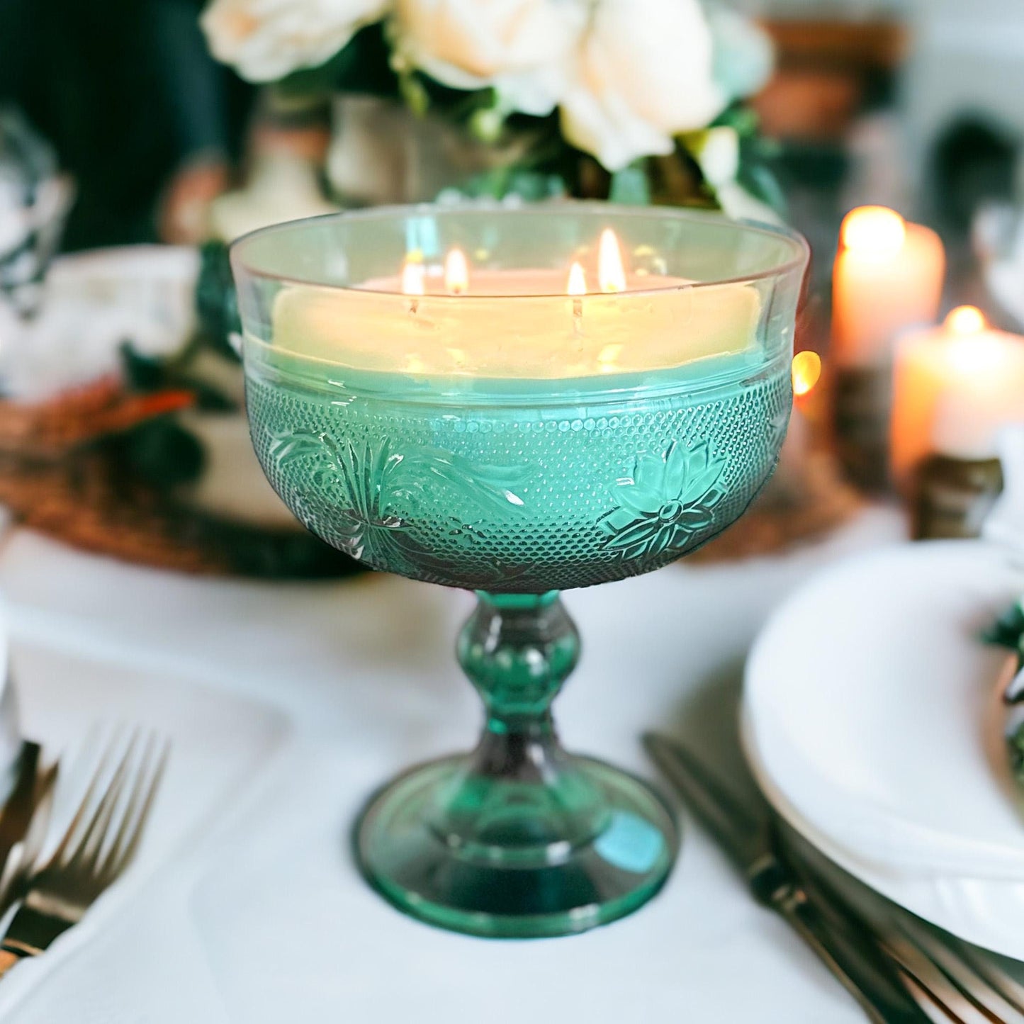 Retrowix soy candle in vintage green bowl on pedestal.